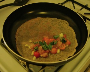 Crepe with tomato and onion filling